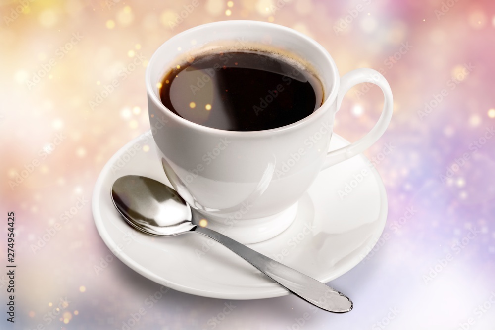 Coffee cup and spoon on wooden background Coffee cup and spoon on wooden background