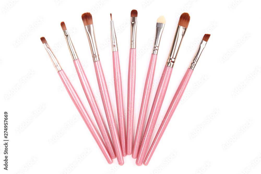 Pink makeup brushes isolated on white background Pink makeup brushes isolated on white background