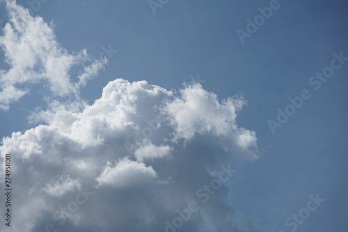 White Puffy Clouds on a Clear Blue Sky © Michael