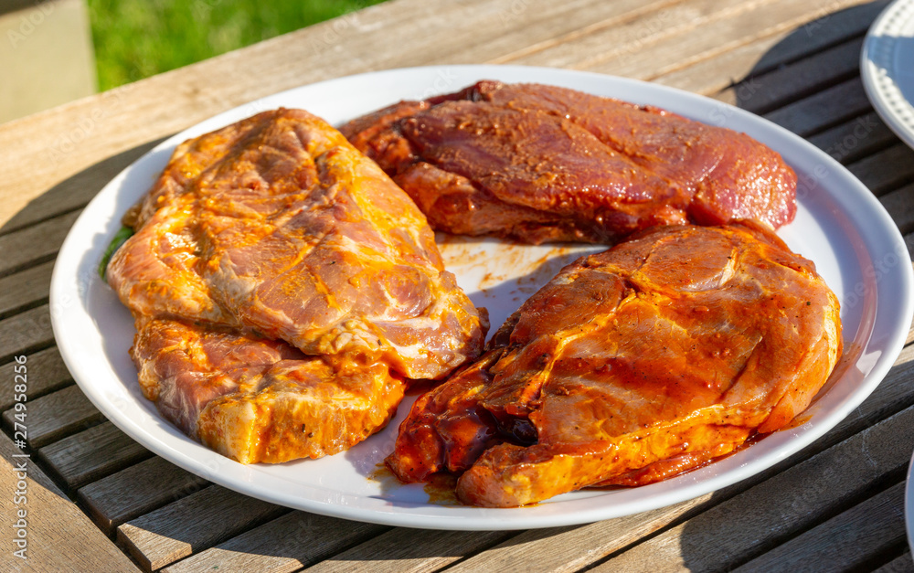 raw meat on a plate - meat barbecue raw meat on a plate - meat barbecue