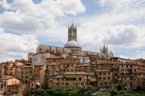Panoramic view of Siena city with historic buildings and street © TravelFlow