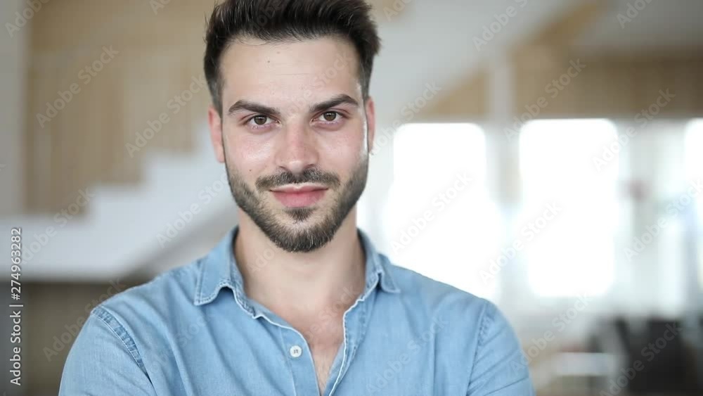 smiling man looking at the camera and makes ok thumbs up hand sign and winks smiling man looking at the camera and makes ok thumbs up hand sign and winks