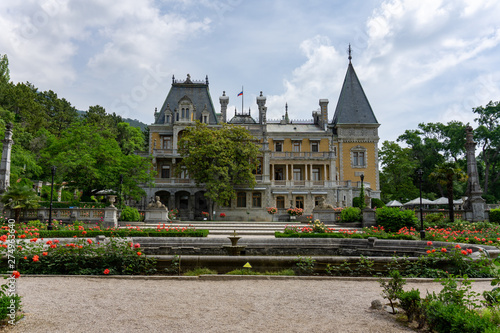 Palace and park with roses