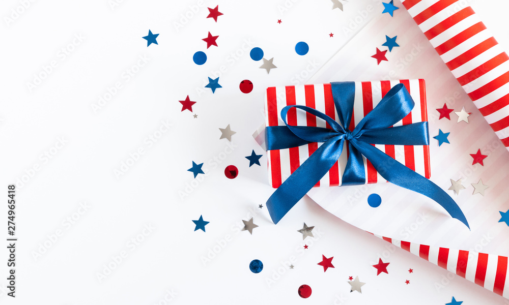 Fototapeta premium 4th of July American Independence Day. Happy Independence Day, decorations on white background. Flat lay, top view, copy space