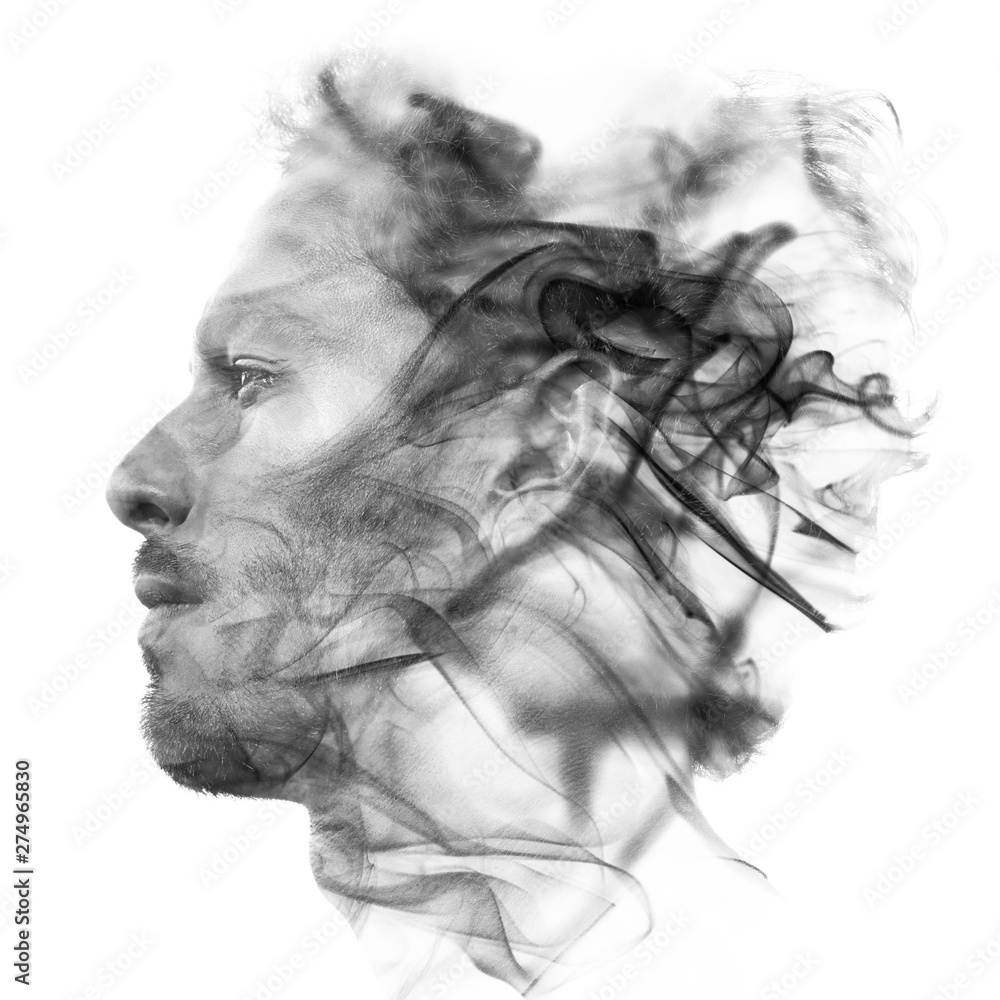 Double exposure portrait of a sexy statuesque man with dark features