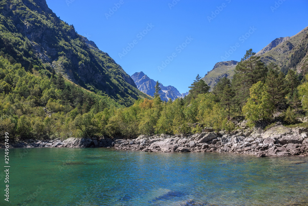 Closeup view of lake scenes in mountains, national park Dombay, Caucasus