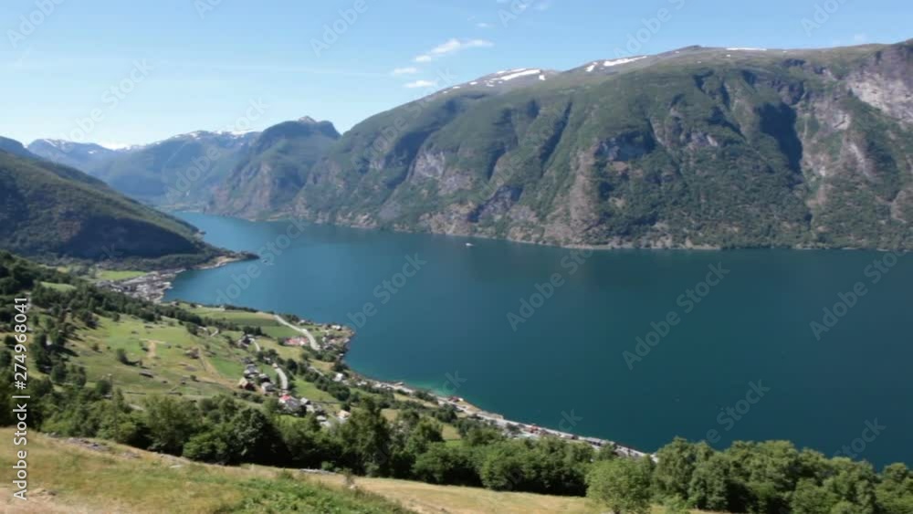Aurlandsfjord long fjord in Sogn og Fjordane county with village Aurlandsvangen. Norway. Seen from Stegastein, route E16. Scandinavia Aurlandsfjord long fjord in Sogn og Fjordane county with village Aurlandsvangen. Norway. Seen from Stegastein, route E16. Scandinavia