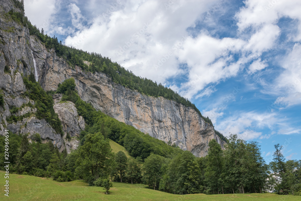 View valley of waterfalls in national park of city Lauterbrunnen, Switzerland