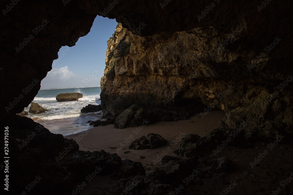 View from rock tunnel at Student beach, Lagos, Portugal