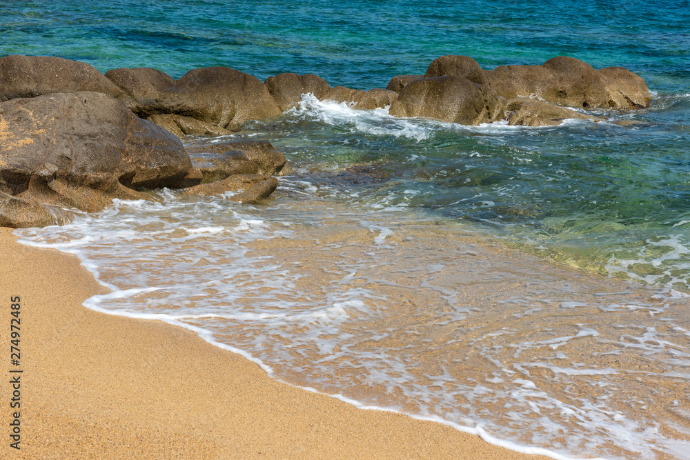 Fototapeta premium Landscape with beach, the sea and the clouds in the blue sky