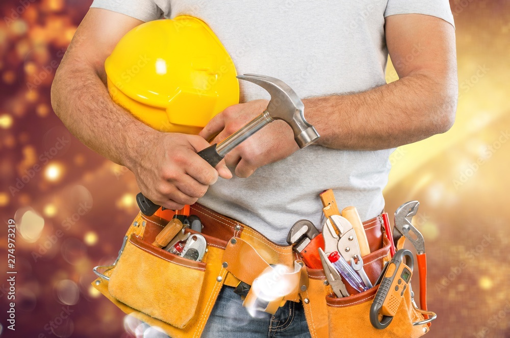 Worker with a tool belt. Isolated over white background. Worker with a tool belt. Isolated over white background.