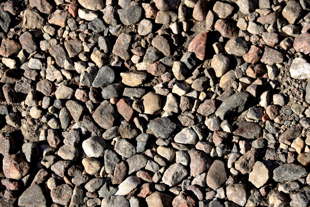 The road, a pedestrian path made of stones of different shapes The road, a pedestrian path made of stones of different shapes
