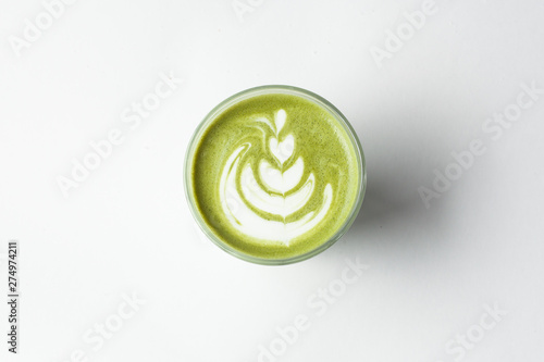 Green japanese matcha latte with hot milk for breakfast isolated on white background