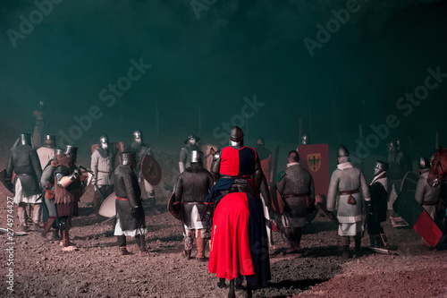 Wallpaper Mural Unidentified participants during a historical reenactment. Medieval warriors standing on the battlefield after the fight. Torontodigital.ca