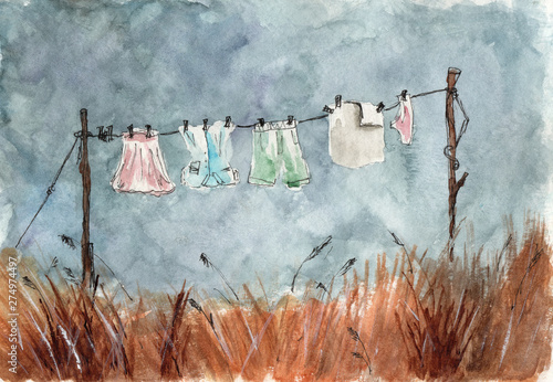 Watercolor illustration of laundry in the field before the storm