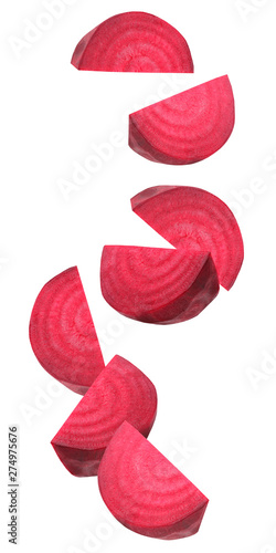Falling pieces of beetroot isolated on white background.