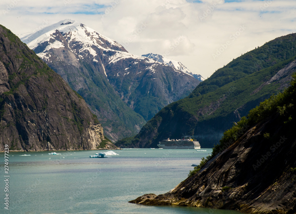 Fjords in Alaska, Tracy Arm Glacier, Mountains and lakes, ships sailing in fjords, Ice in water, snow on mountain, Tourism in Alaska