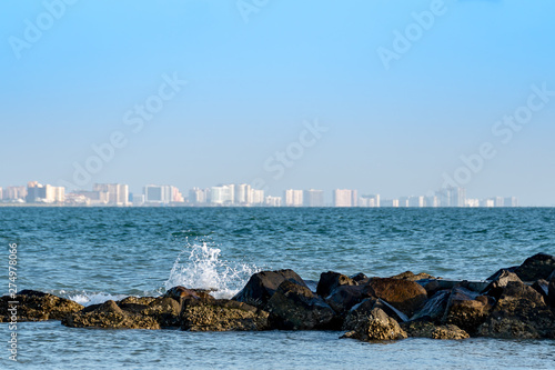 View of Clearwater, Florida with the waves crashing on the jetty  © Karyn