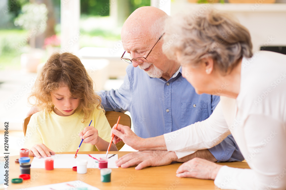 Grandson and grandparents playing together Grandson and grandparents playing together