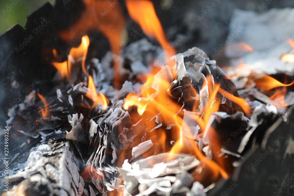 Fire, dust and books at fire flame, papers Fire, dust and books at fire flame, papers
