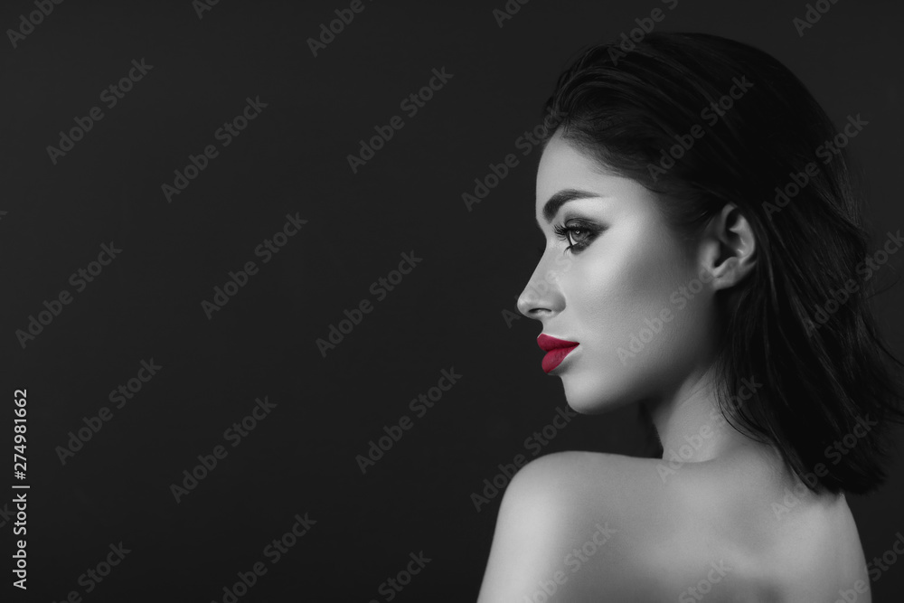 Professional make up brunette girl. Black and white only red lips Professional make up brunette girl. Black and white only red lips