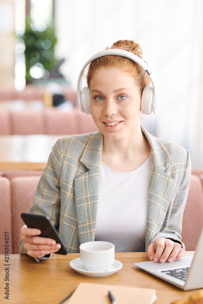 Portrait of cheerful beautiful redhead teenage student Portrait of cheerful beautiful redhead teenage student