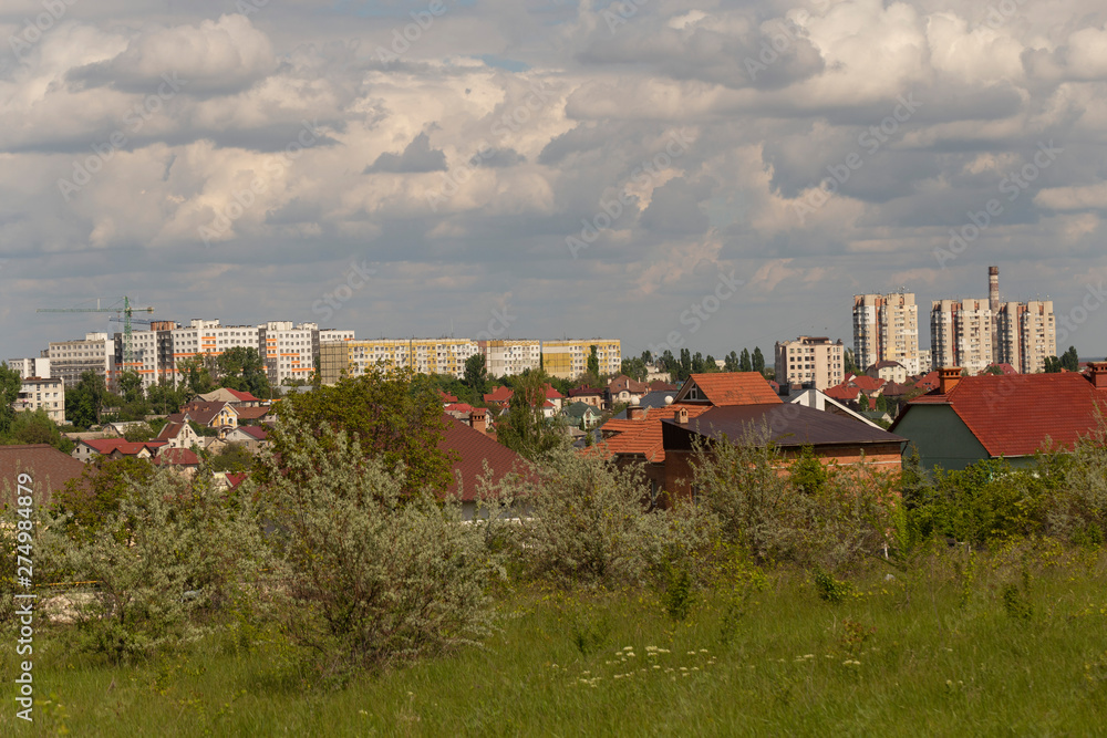 Outskirts of Chisinau. Panorama with the capital of Moldova. Cloudy sky before the rain. Outskirts of Chisinau. Panorama with the capital of Moldova. Cloudy sky before the rain.