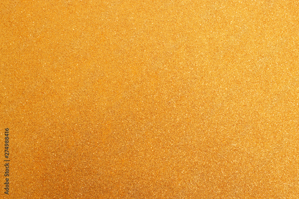 Golden glittering background texture Golden glittering background texture