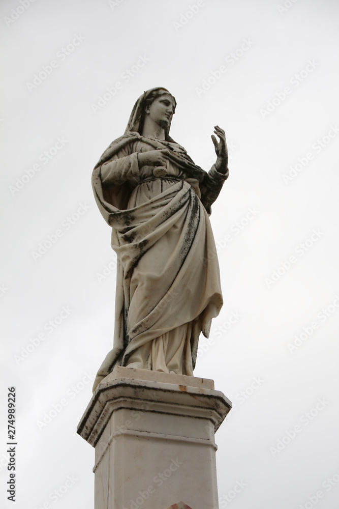 religious statue in cemetary