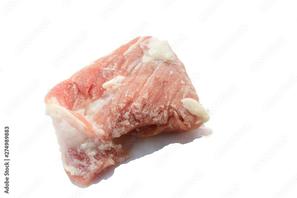 Frozen piece of meat on a white background. Frozen piece of meat on a white background.