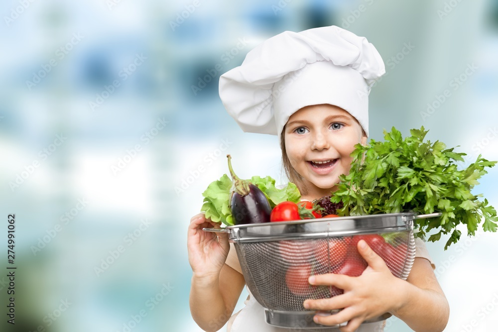 Portrait of adorable little girl preparing healthy food at kitchen Portrait of adorable little girl preparing healthy food at kitchen