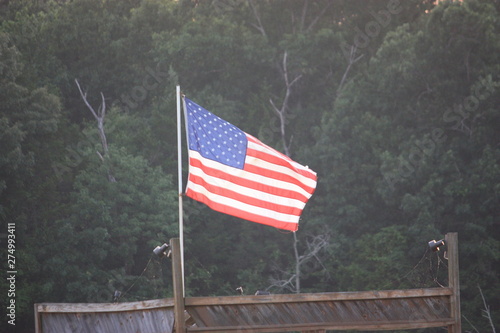 flag flying at the lake