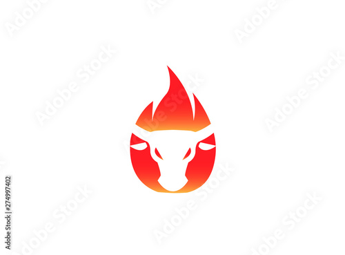 buffalo bullhead in fire angry cow flame for logo design illustration photo