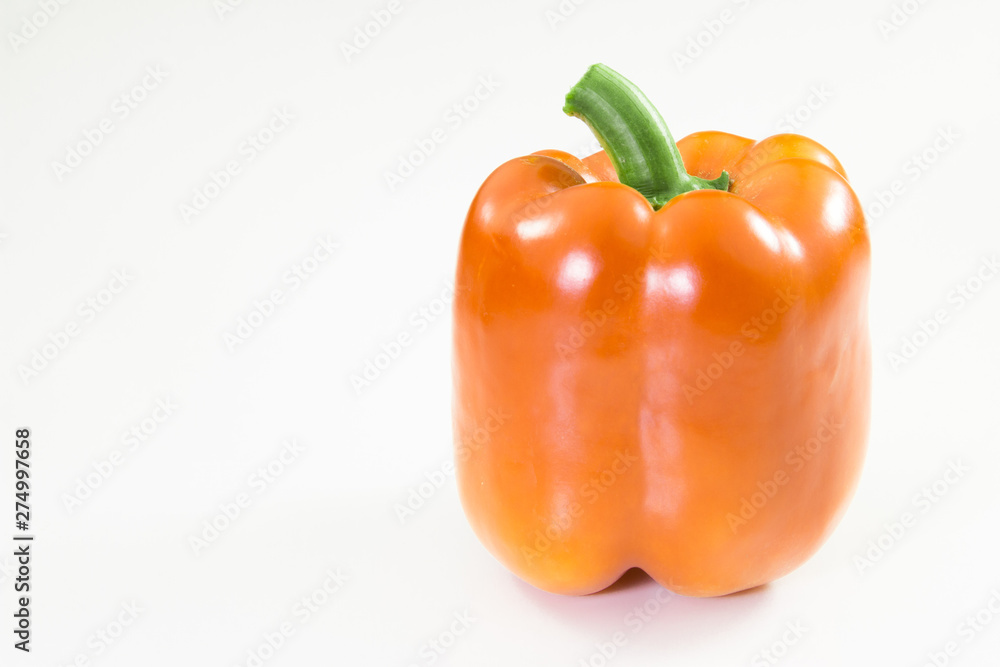 Orange Bell Pepper on a white background. Orange Bell Pepper on a white background.