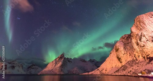Lockdown Time-lapse: Aurora Borealis Hovering and Passing Above Hamnoy Norway - Hamnoy, Norway photo