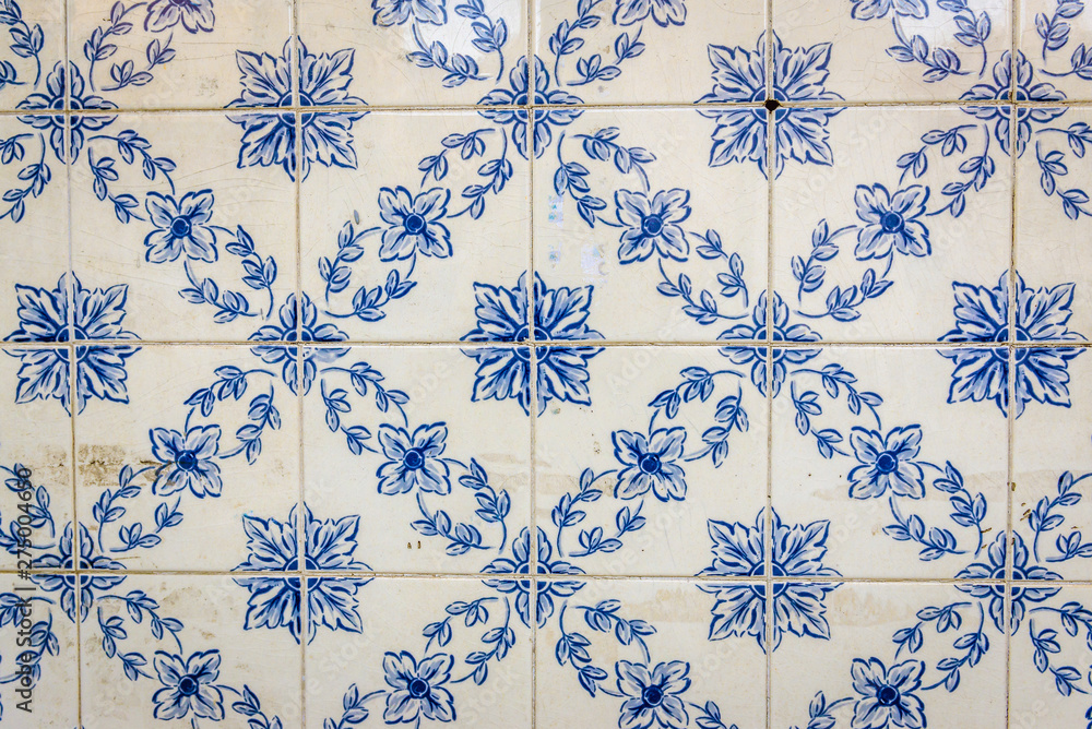 Close up on a house wall covered with traditional Azulejo tiles in Lisbon city, Portugal