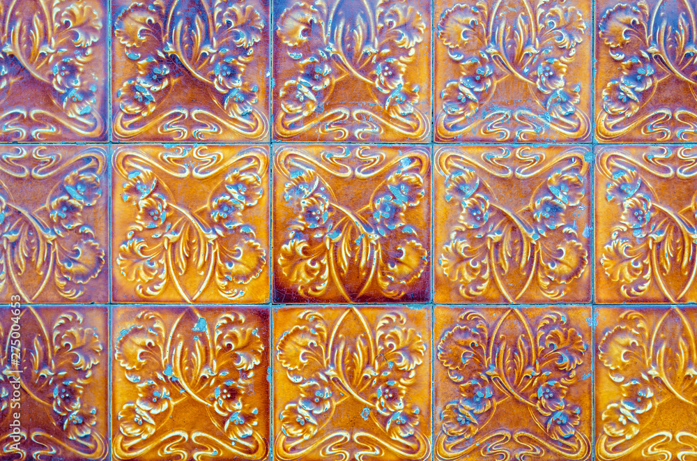 Close up on a house wall covered with traditional Azulejo tiles in Lisbon city, Portugal