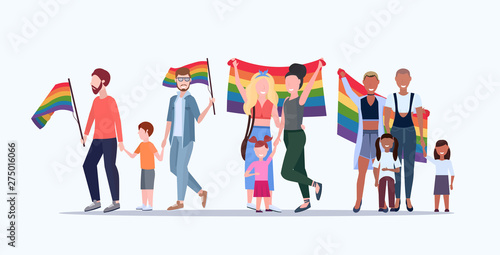 gays and lesbians with children holding rainbow flag lesbian gay same sex mix race parents group love parade lgbt pride festival concept flat full length horizontal photo