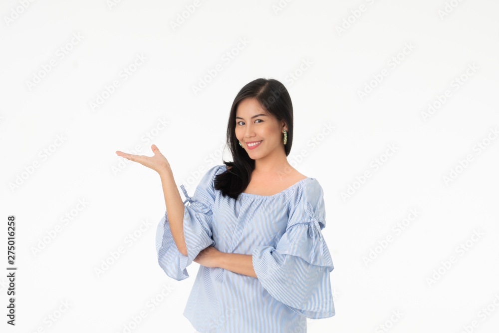 Portrait of Asian young woman is looking her hand isolated on white background Portrait of Asian young woman is looking her hand isolated on white background