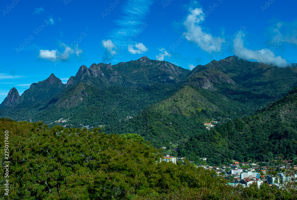 Mountains and city. Beauty of the mountains. Mountain of the Finger of God. City of Teresopolis, state of Rio de Janeiro, Brazil, South America. Mountains and city. Beauty of the mountains. Mountain of the Finger of God. City of Teresopolis, state of Rio de Janeiro, Brazil, South America.