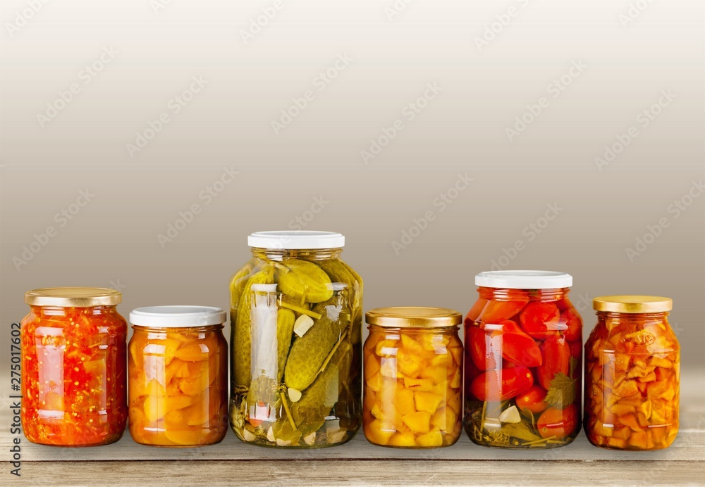 Home Canning Jars of Summer Harvest Vegetable on White Backgroun Home Canning Jars of Summer Harvest Vegetable on White Backgroun