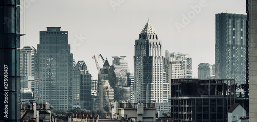 cityscape of modern building with filter darmatic tone background banner