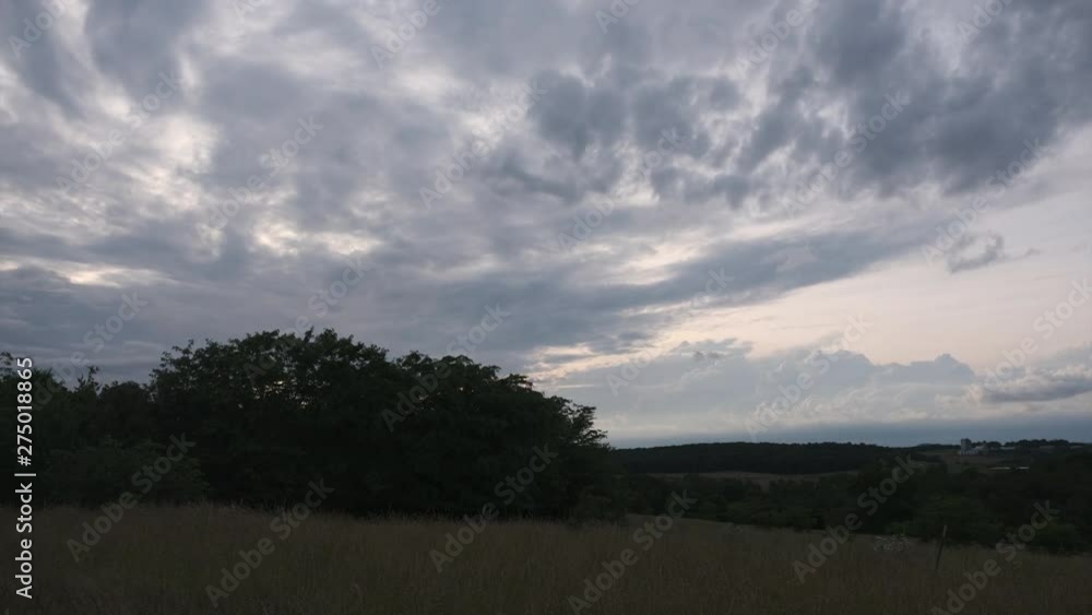 Beautiful landscape of a farmland at evening. Time lapse Beautiful landscape of a farmland at evening. Time lapse