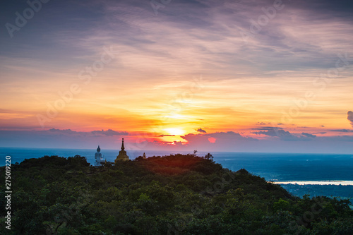 Buddha statue and pagoda on high mountain in Phu-Lang-Ka national park, Thailand.