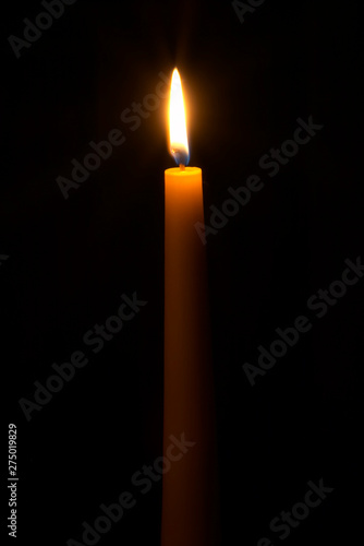 Candle flame close up on a black background