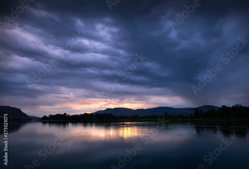 Kamloops Clouds Thompson River. Dramatic clouds at sunset over the Thompson River in Kamloops.