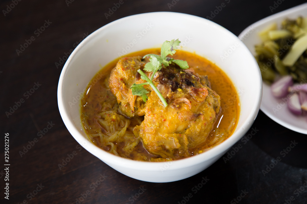 Top view , Curried Noodle Soup with Chicken ( Khao Soi Recipe) - Thai food. Top view , Curried Noodle Soup with Chicken ( Khao Soi Recipe) - Thai food.