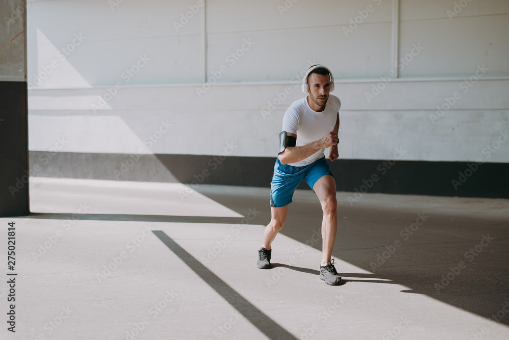 Young man is preparing to run Young man is preparing to run