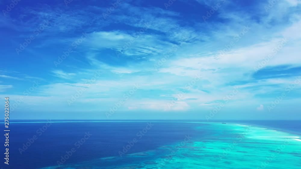 Aerial View Of Turquoise Lagoon And Coral Reef Bora Bora Island South Pacific, aerial drone panning left shot Aerial View Of Turquoise Lagoon And Coral Reef Bora Bora Island South Pacific, aerial drone panning left shot