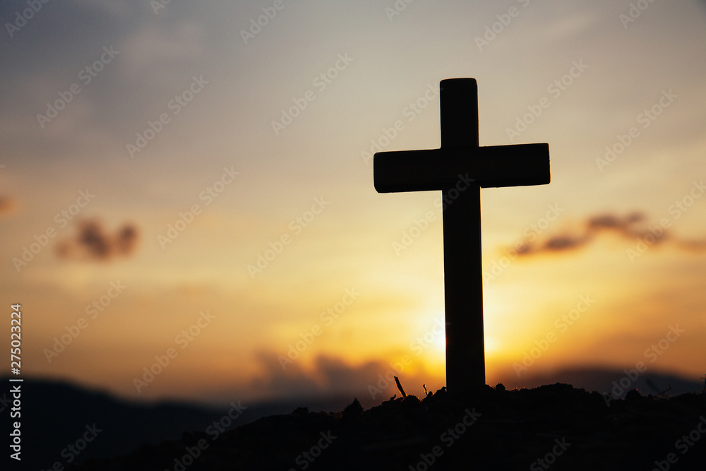 Jesus Christ cross. Easter, resurrection concept. Christian wooden cross on a background with dramatic lighting. Jesus Christ cross. Easter, resurrection concept. Christian wooden cross on a background with dramatic lighting.